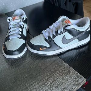 Nike dunks with mini swoosh